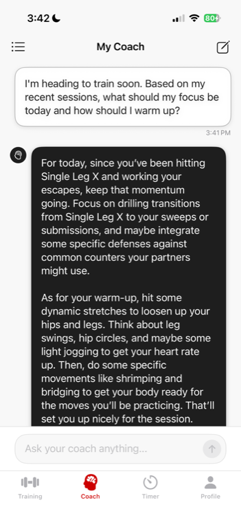 The AI coach answering a question about training focus and warmup